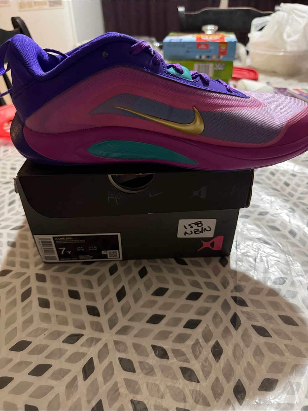 Nike Kids Purple/Pink Basketball Sneakers with Gold Swoosh